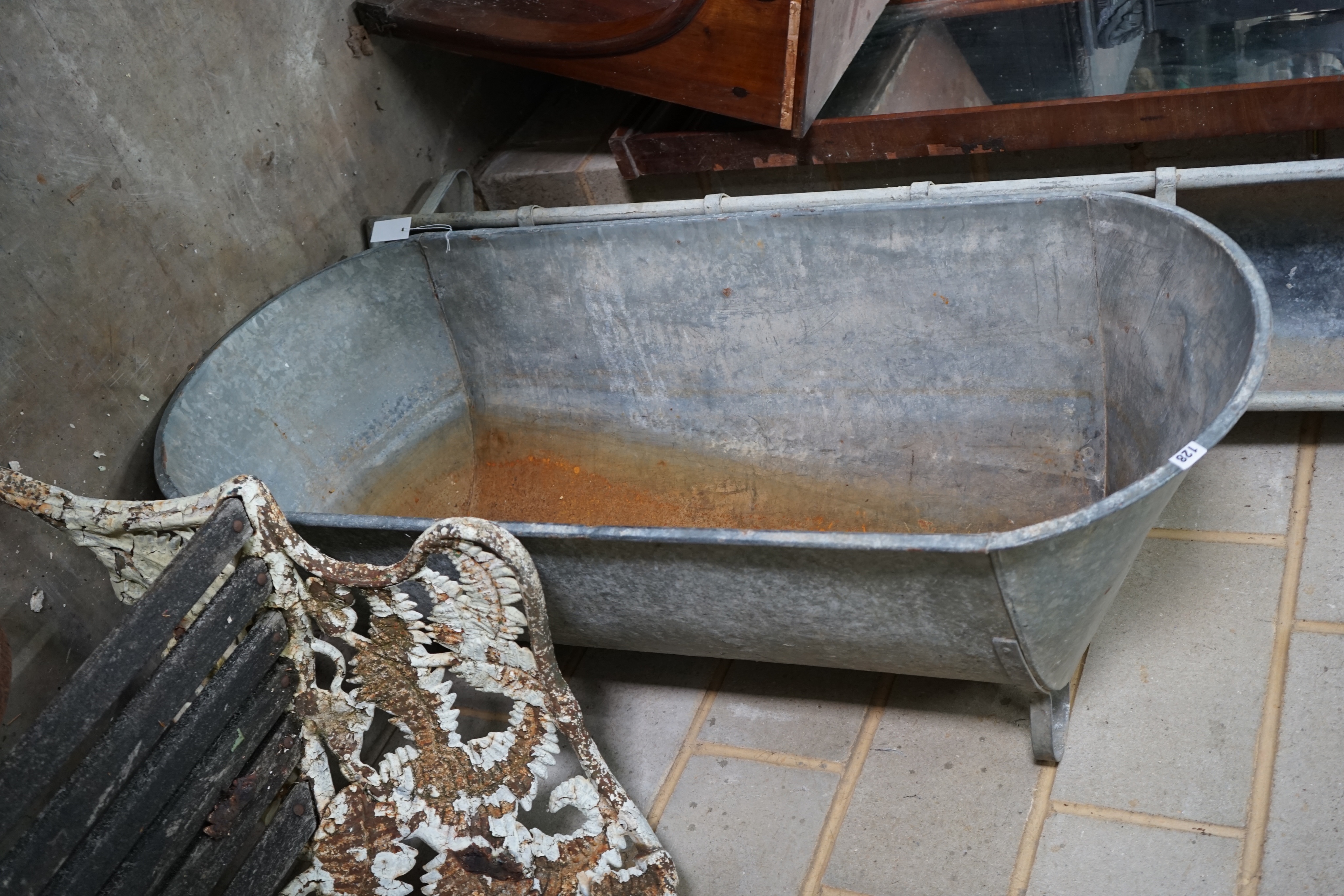 A vintage galvanised trough / planter, length 141cm depth 61cm height 48cm